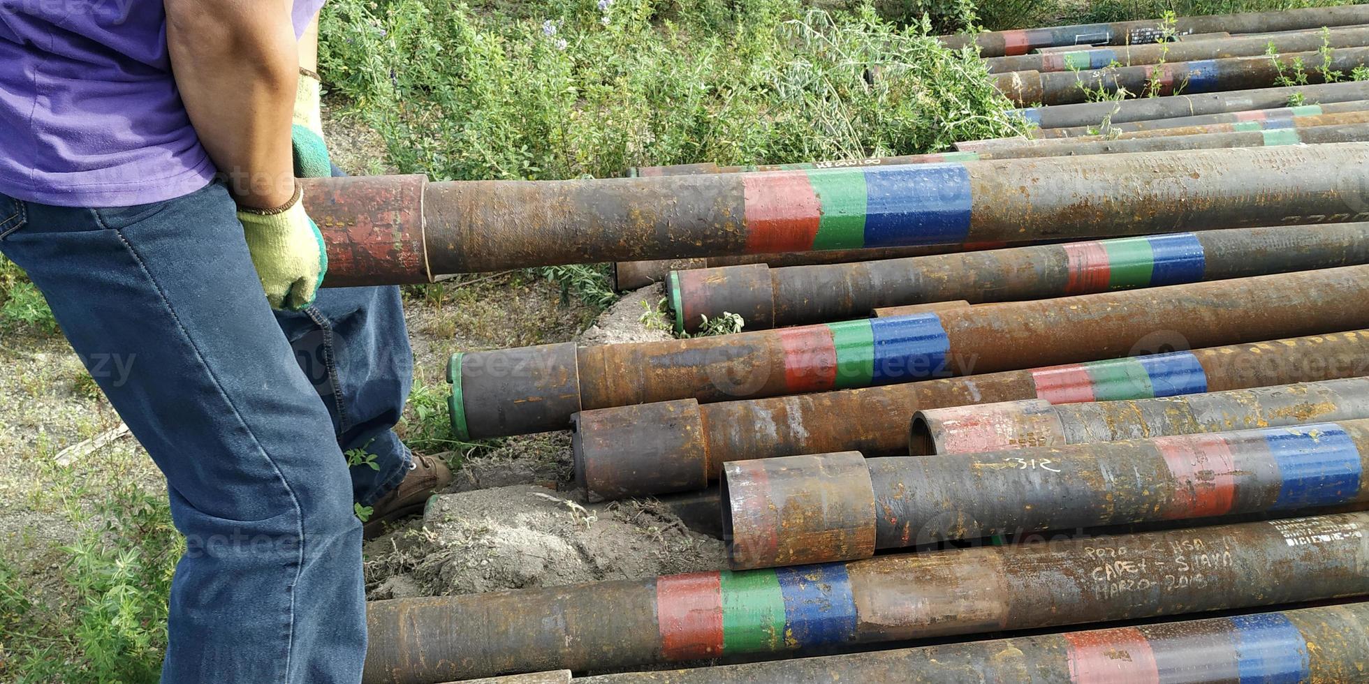 Old second hand drill pipes photo