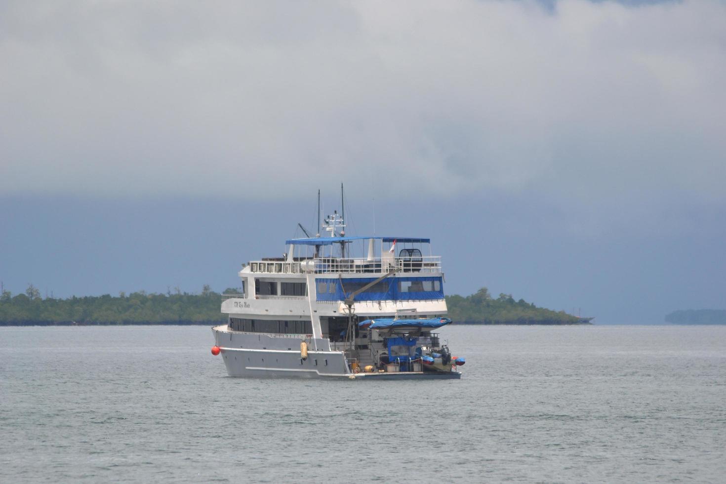 A cruiser ship mooring at the sea photo