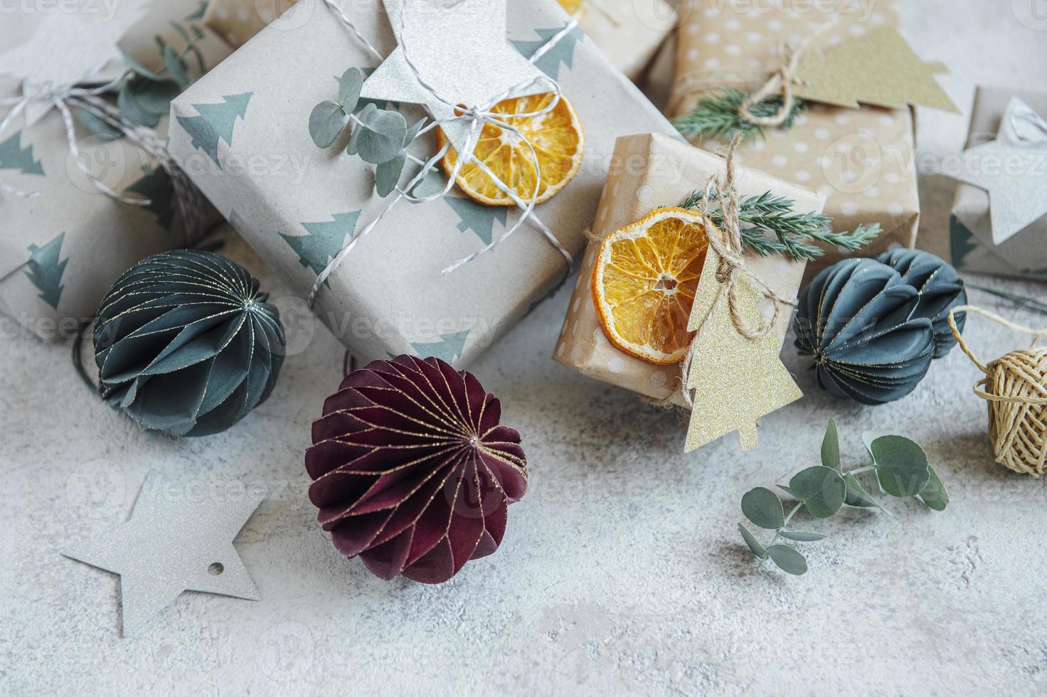 Christmas  decorative homemade gift box wrapped in brown kraft paper photo