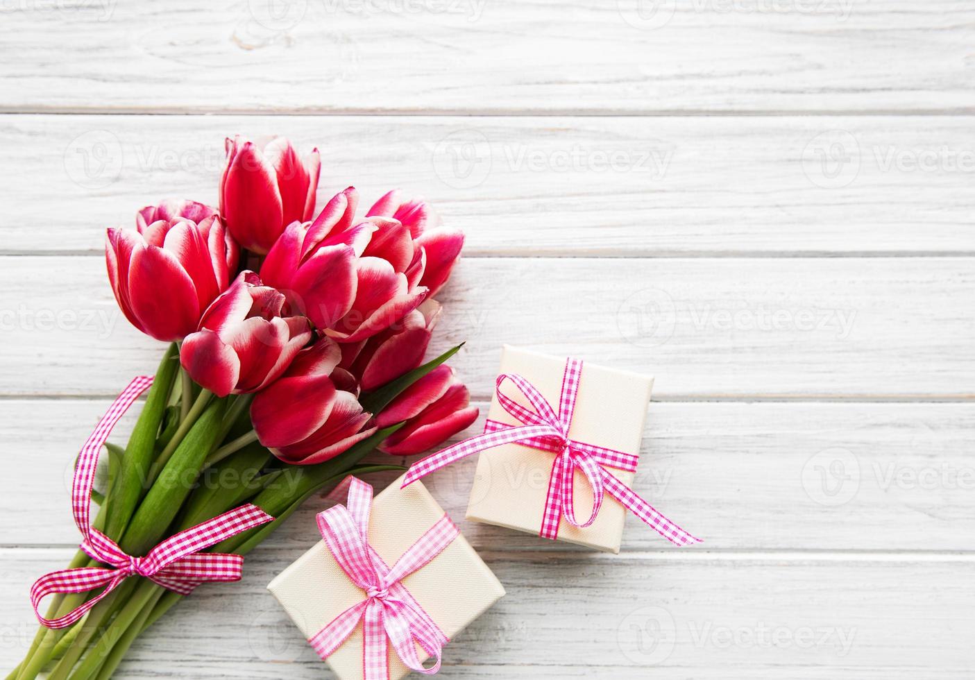 Gift box and tulips bouquet photo