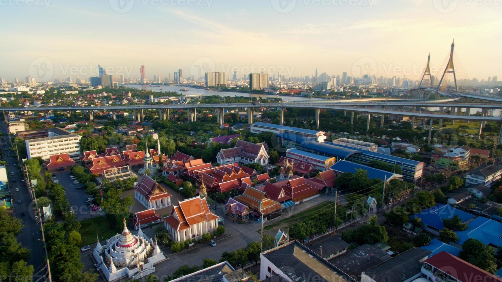 aerial view of temple and bhumibol bridge in bangkok thailand photo