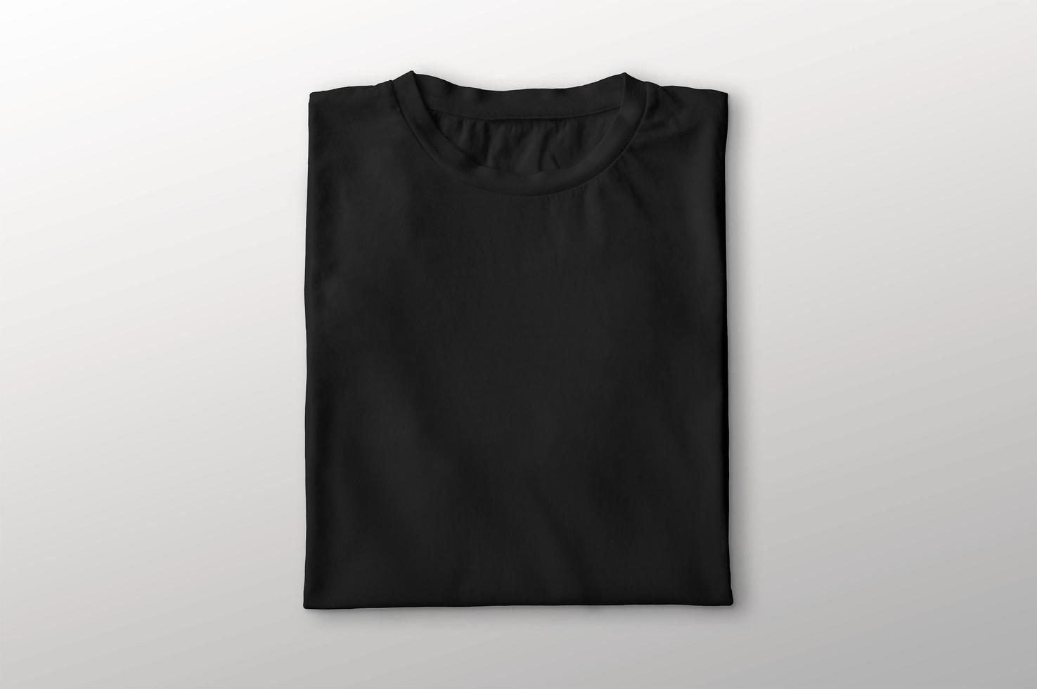 Folded Black T-Shirt 4479640 Stock Photo at Vecteezy