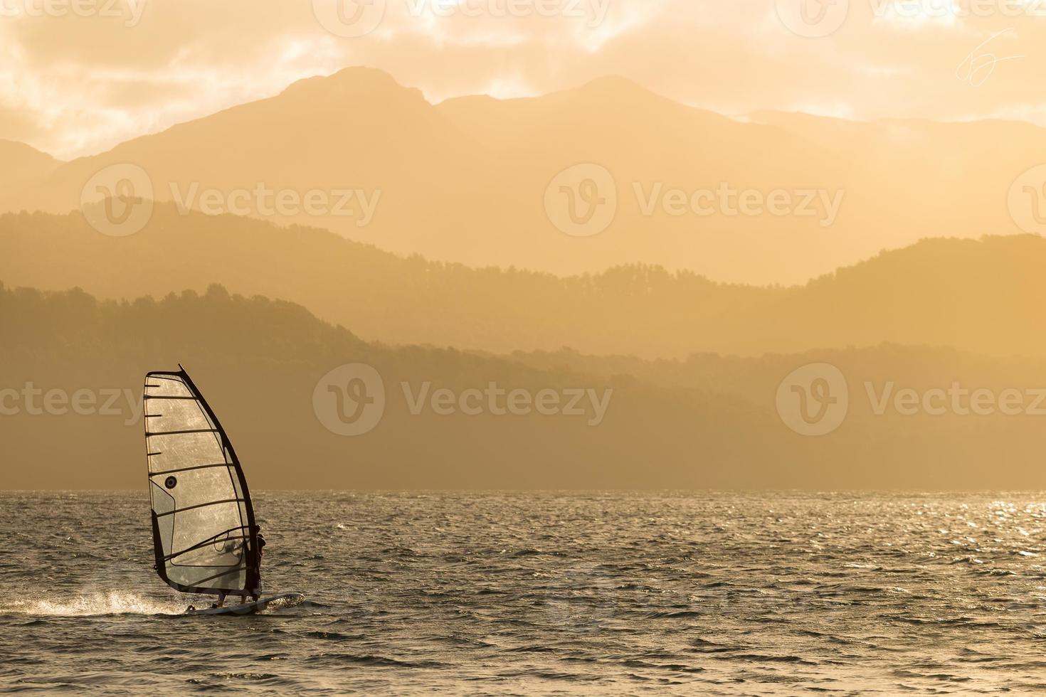 windsurf in mountains landscape photo