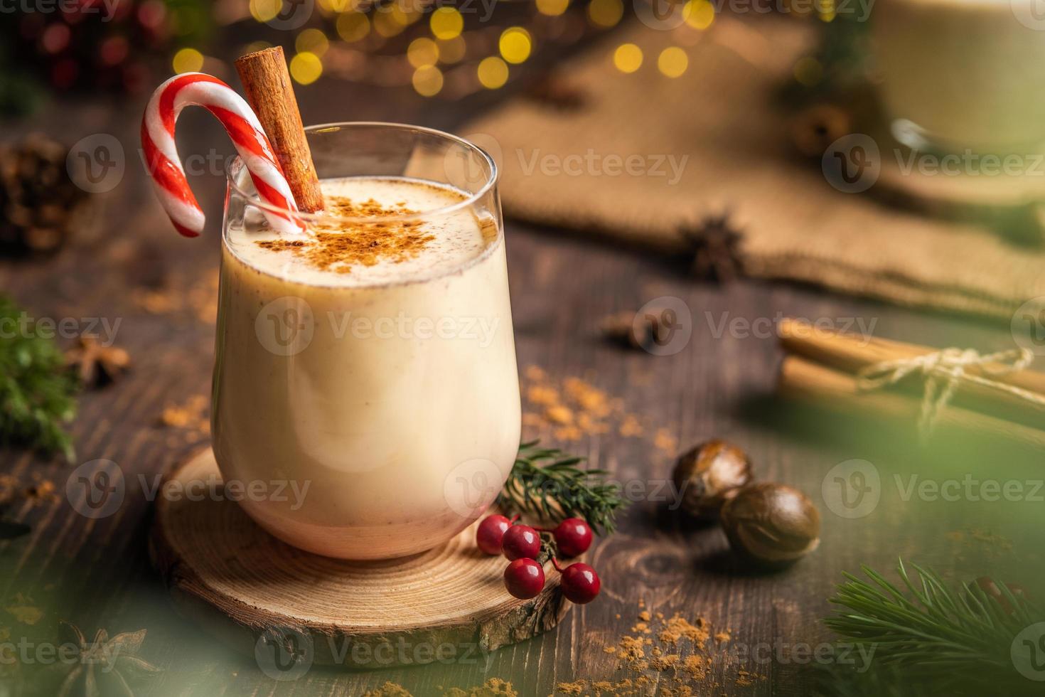 Eggnog with spicy cinnamon.Christmas and winter holidays photo