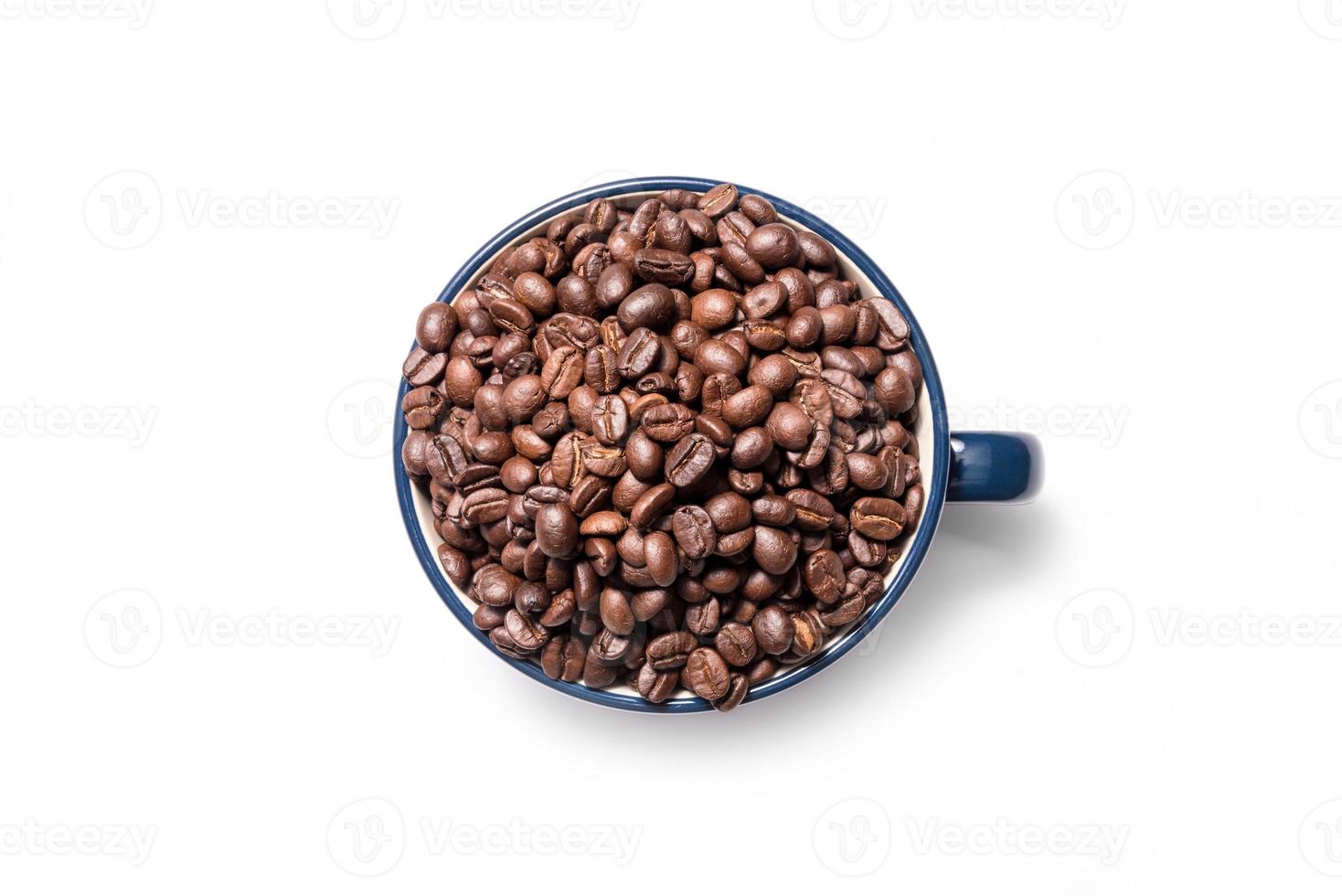 Coffee cup and coffee beans on a white background photo