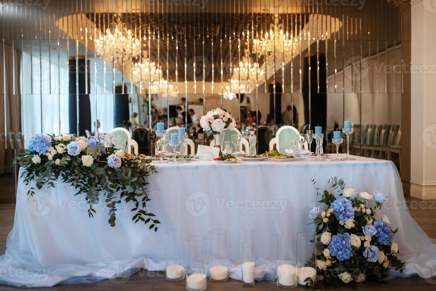 The presidium of the newlyweds in the banquet hall of the restaurant photo