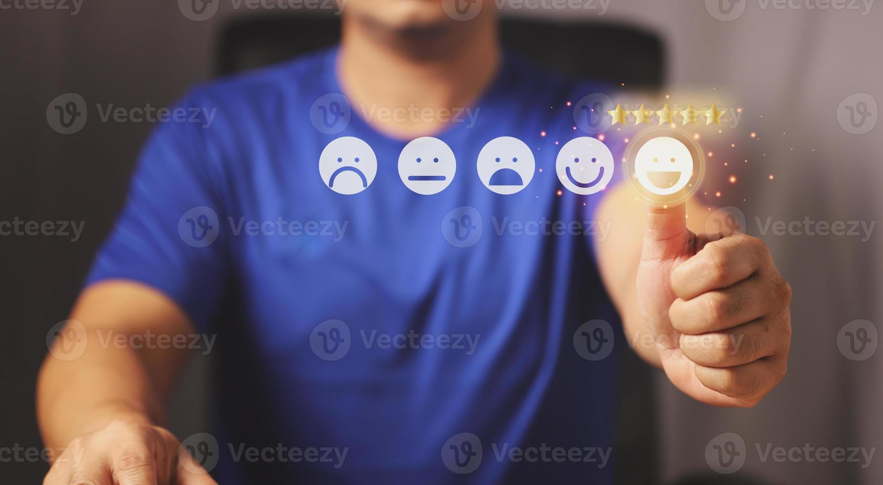 Businessman giving rating with happy icon, Customer Experiences Concept. Positive Review and Feedback, Businessman in Suit Present Excellent Rating with Smiling icon for a Satisfaction. photo