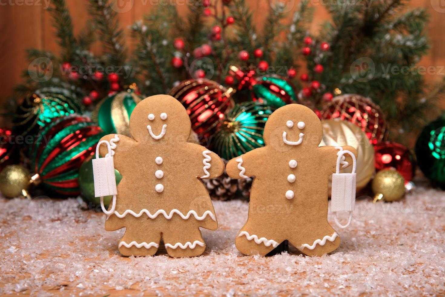 Family of Gingerbreads with kids on Holiday Christmas Background photo