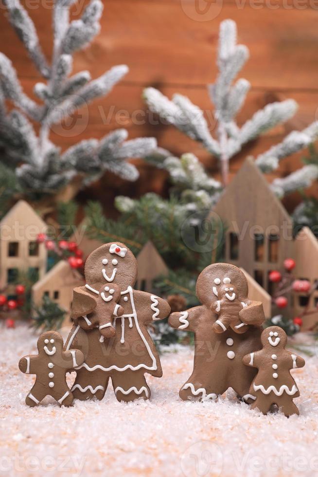 Adorable GingerBread Mom Dad and Children Having a Merry Christmas photo