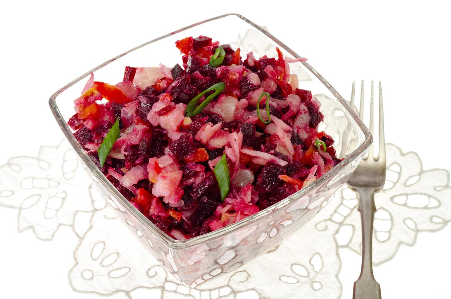 Vegetarian vegetable salad with beets, bright napkin. photo