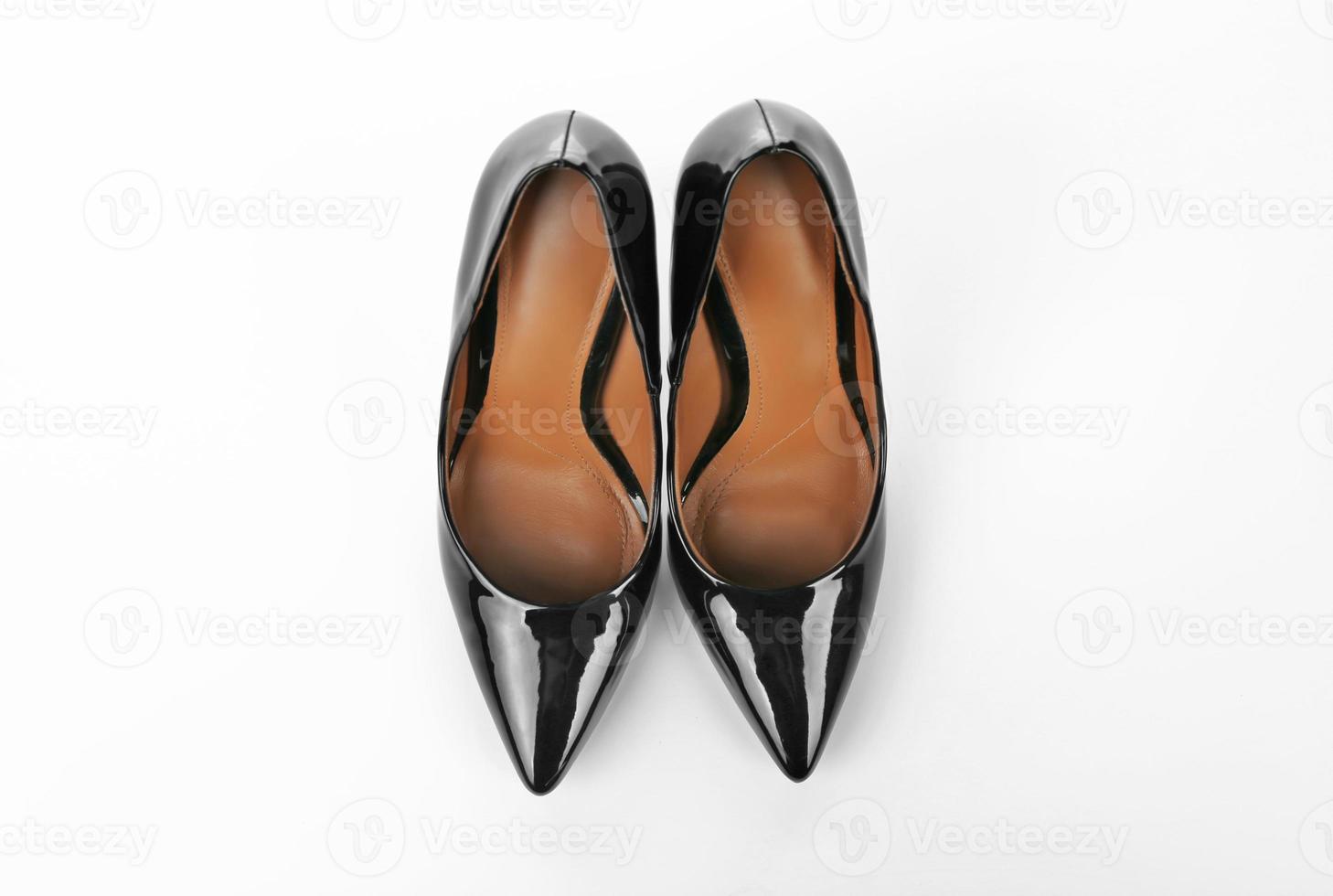 Stylish female shoes on white background photo
