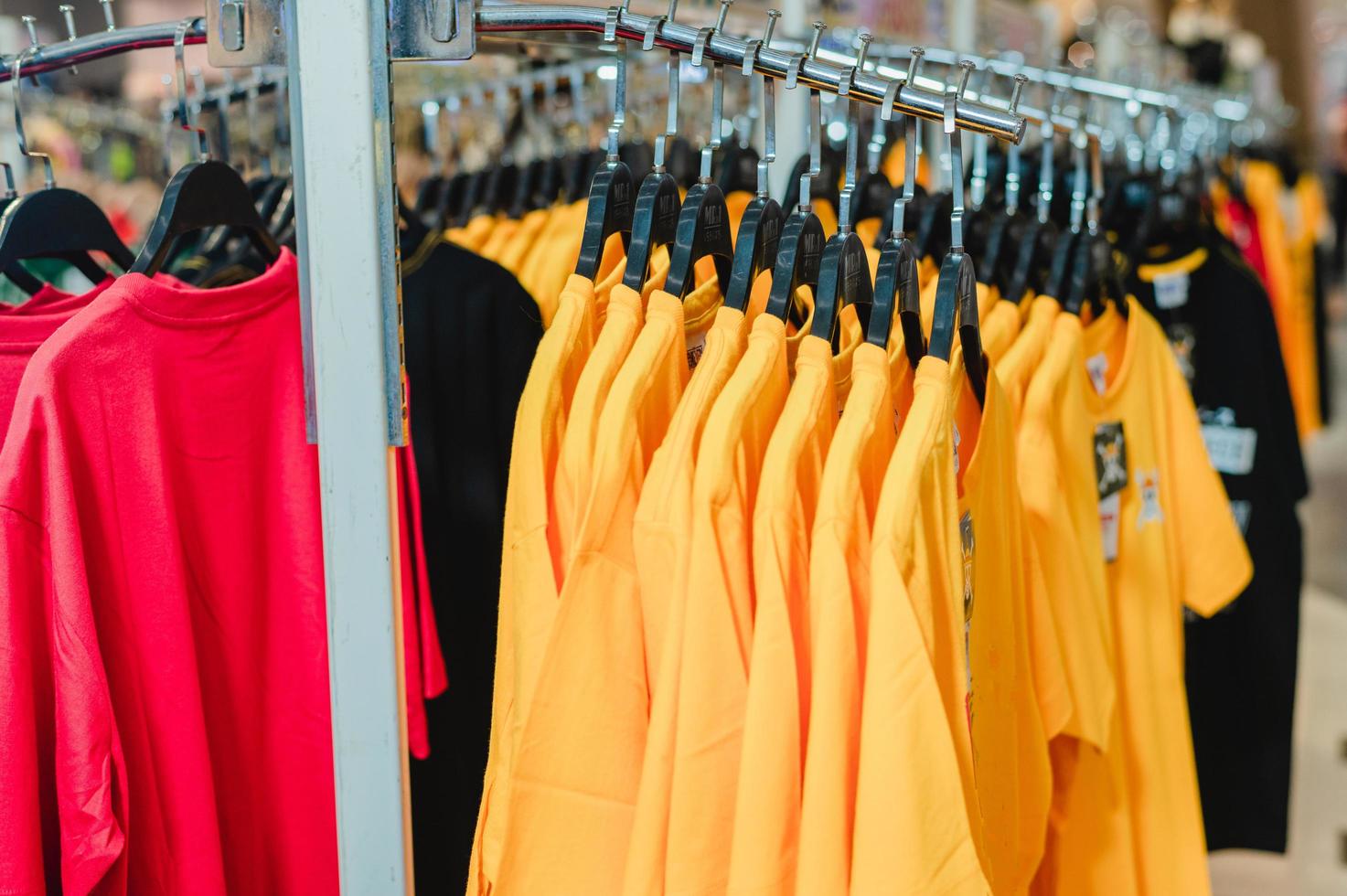 T-shirt on a hanger in a shirt shop photo