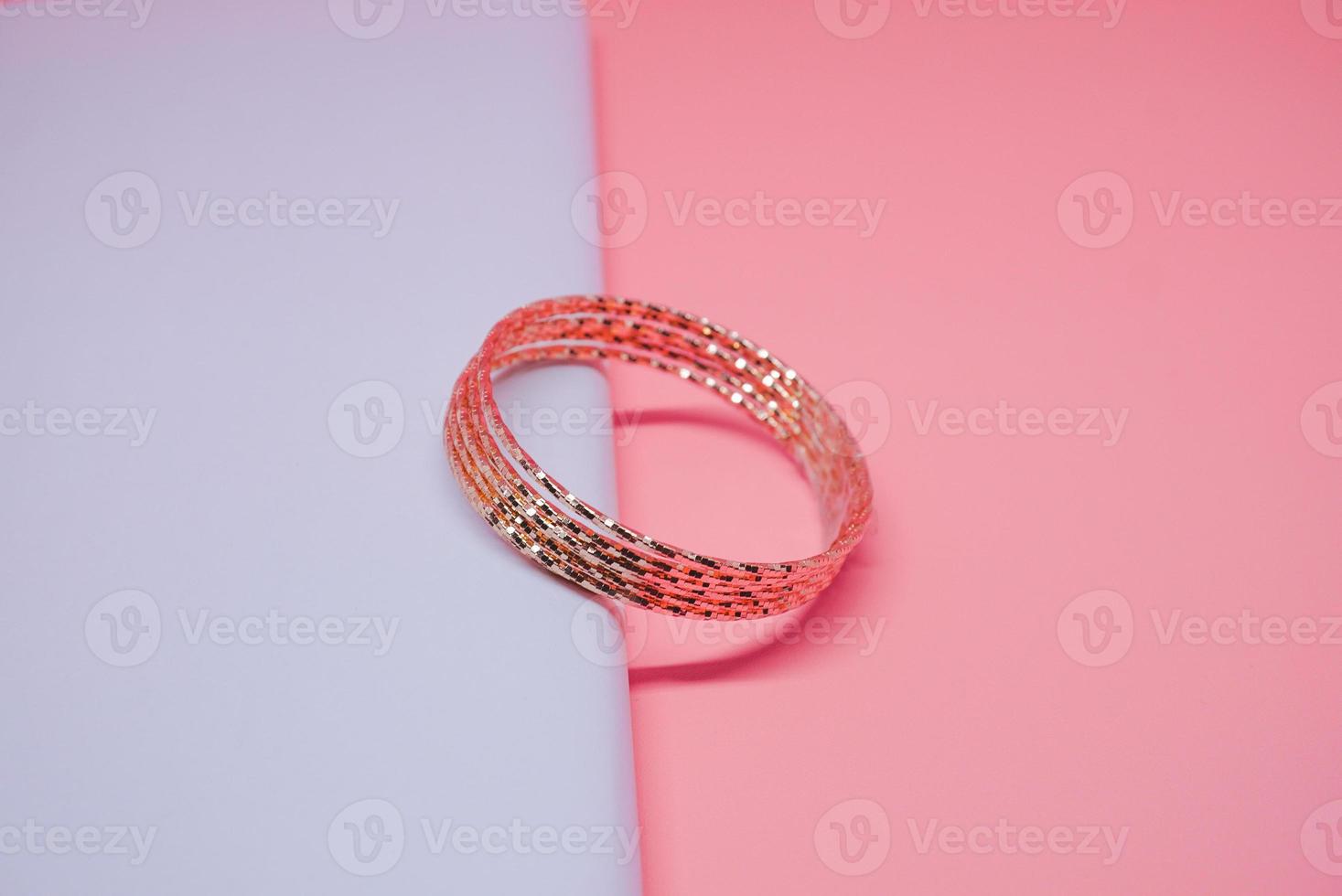 Luxury womens gold bracelet photo on peach