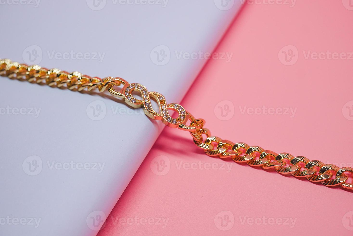 photo of women's gold bracelet with round motifs with sparkling jewelry