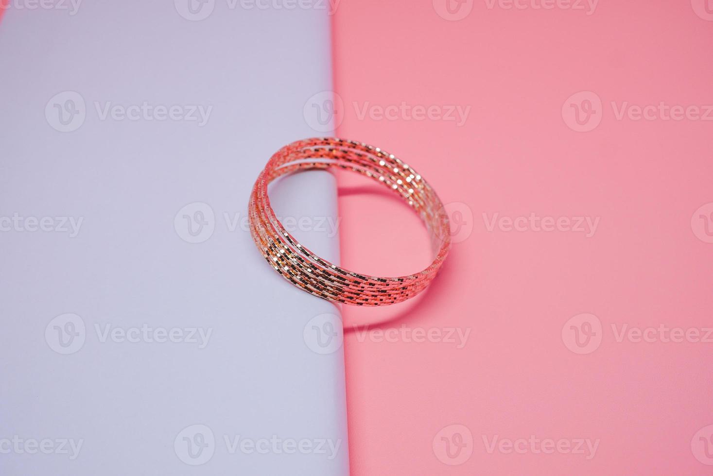 Luxury womens gold bracelet photo on peach