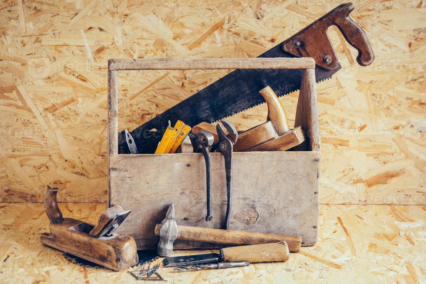 Old Wooden Tool Box Full of Tools. Old carpentry tools photo