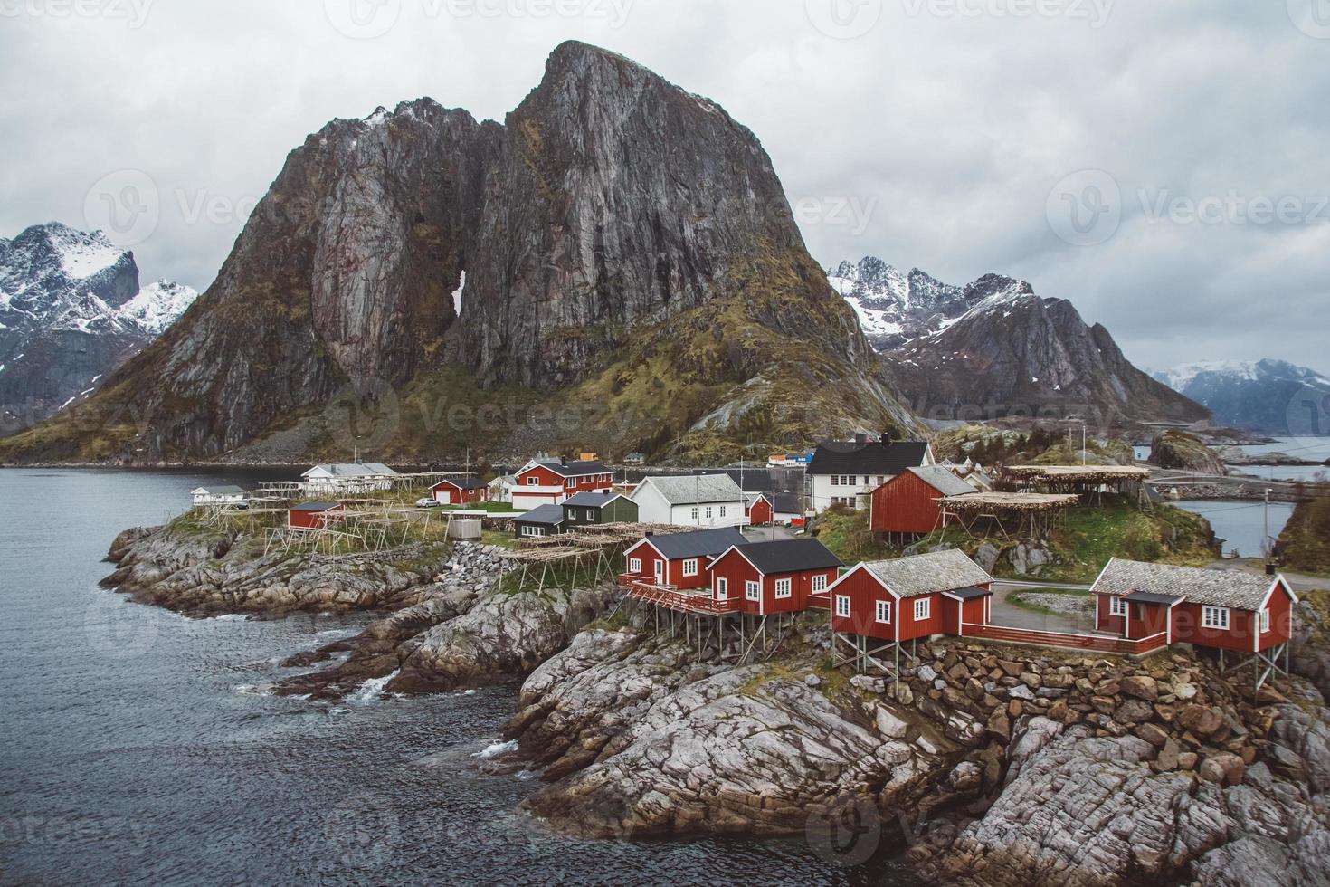 Norway rorbu houses and mountains rocks over fjord landscape scandinavian travel view Lofoten islands photo