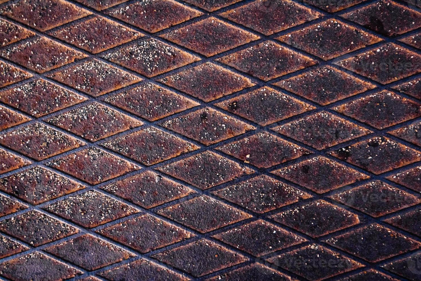 Textura de superficie de metal oxidado con formas rómbicas foto