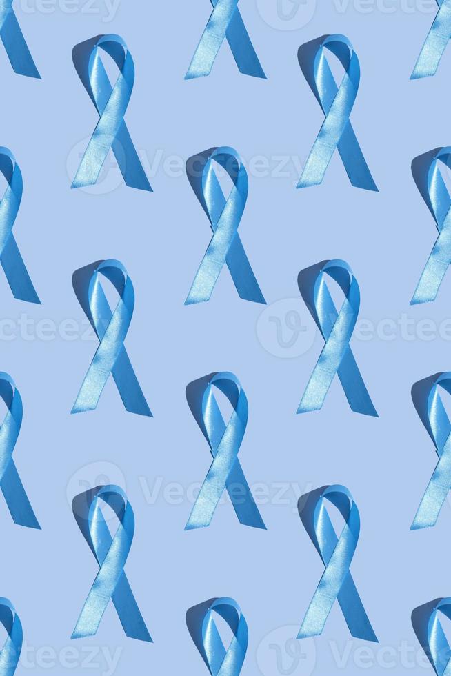 Concept for world diabetes day 14 november. Symbolic color bow to raise awareness on the day of diabetes on a light background. Seamless pattern. photo