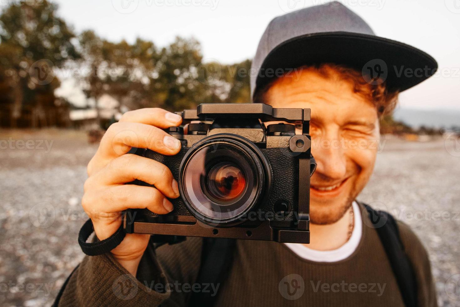 Man taking a photo with a professional camera