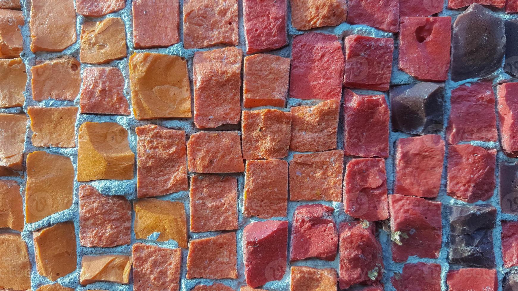 mosaico antiguo multicolor de pequeñas piedras foto