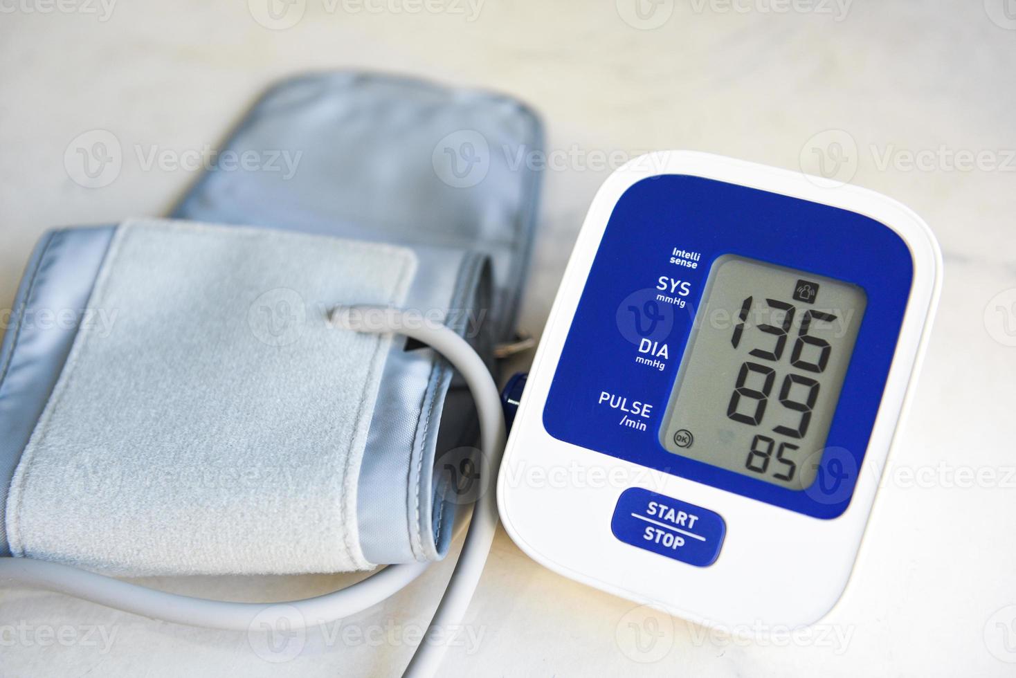 Blood Pressure Monitor Digital on table , Medical electronic tonometer check blood pressure and heart rate Health and Medical concept. photo