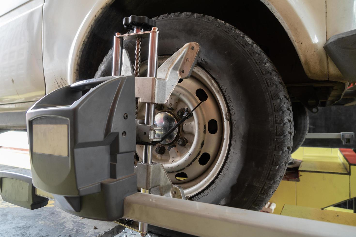 Aligning the wheel of a car photo
