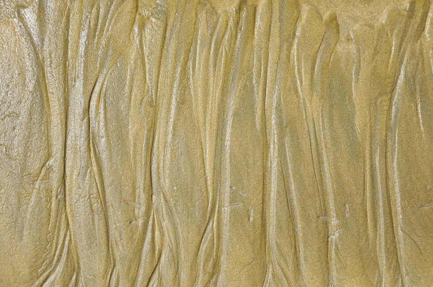 Wet sand with lines photo
