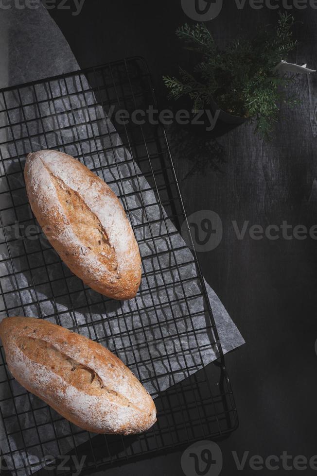 baguette on blue wood table photo
