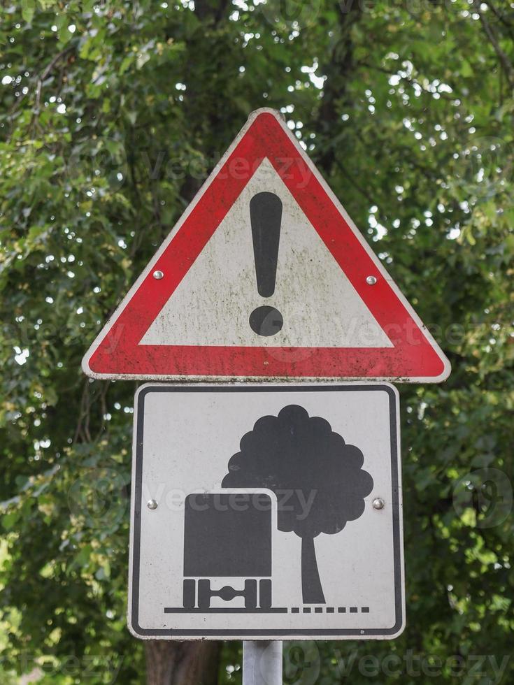 Street sign with trees photo