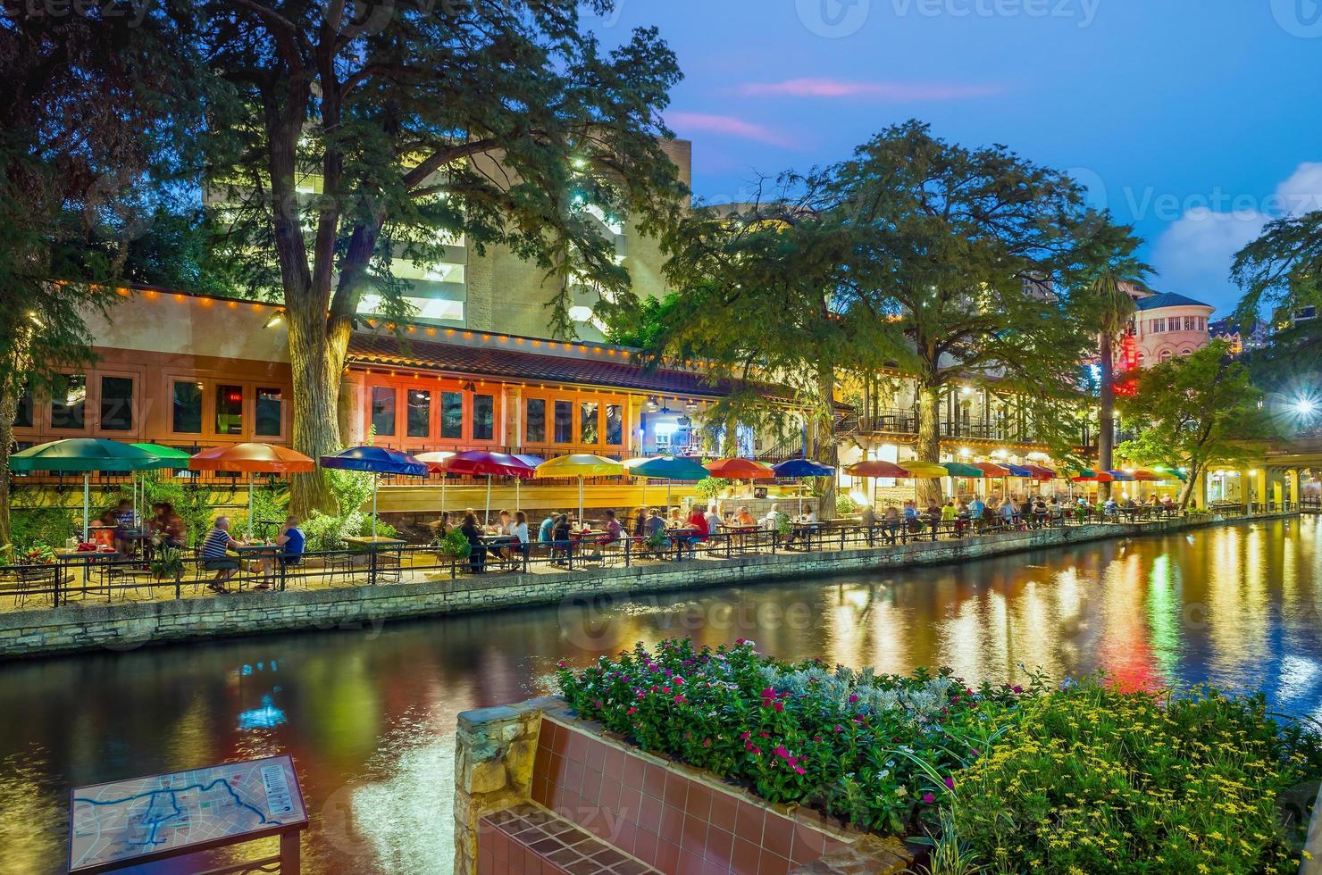 River walk in San Antonio city downtown skyline cityscape of Texas USA photo