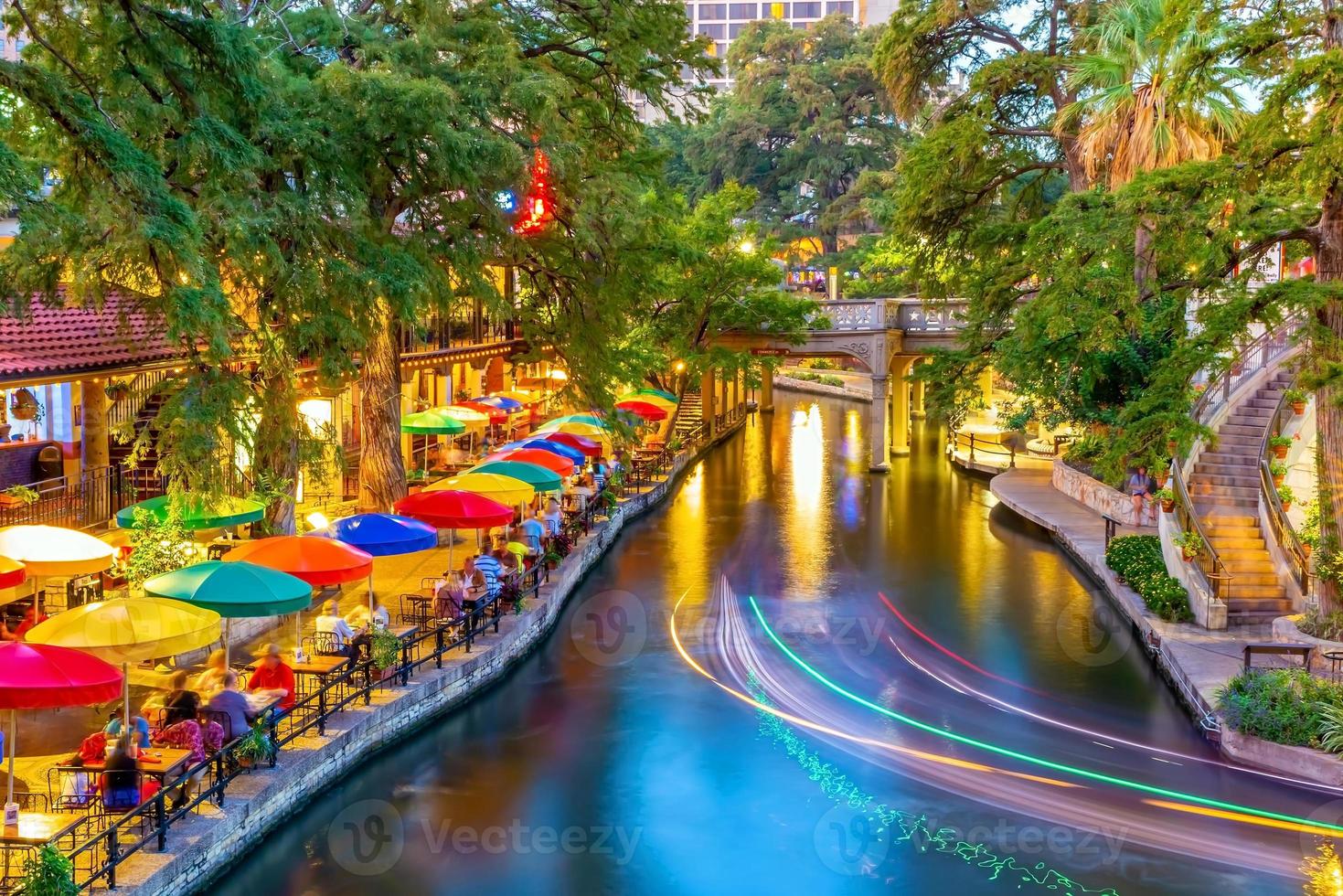 River walk in San Antonio city downtown skyline cityscape of Texas USA photo