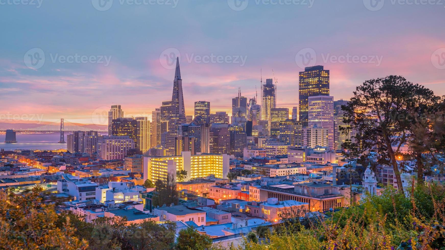 Beautiful view of  business center in downtown San Francisco at sunset. photo