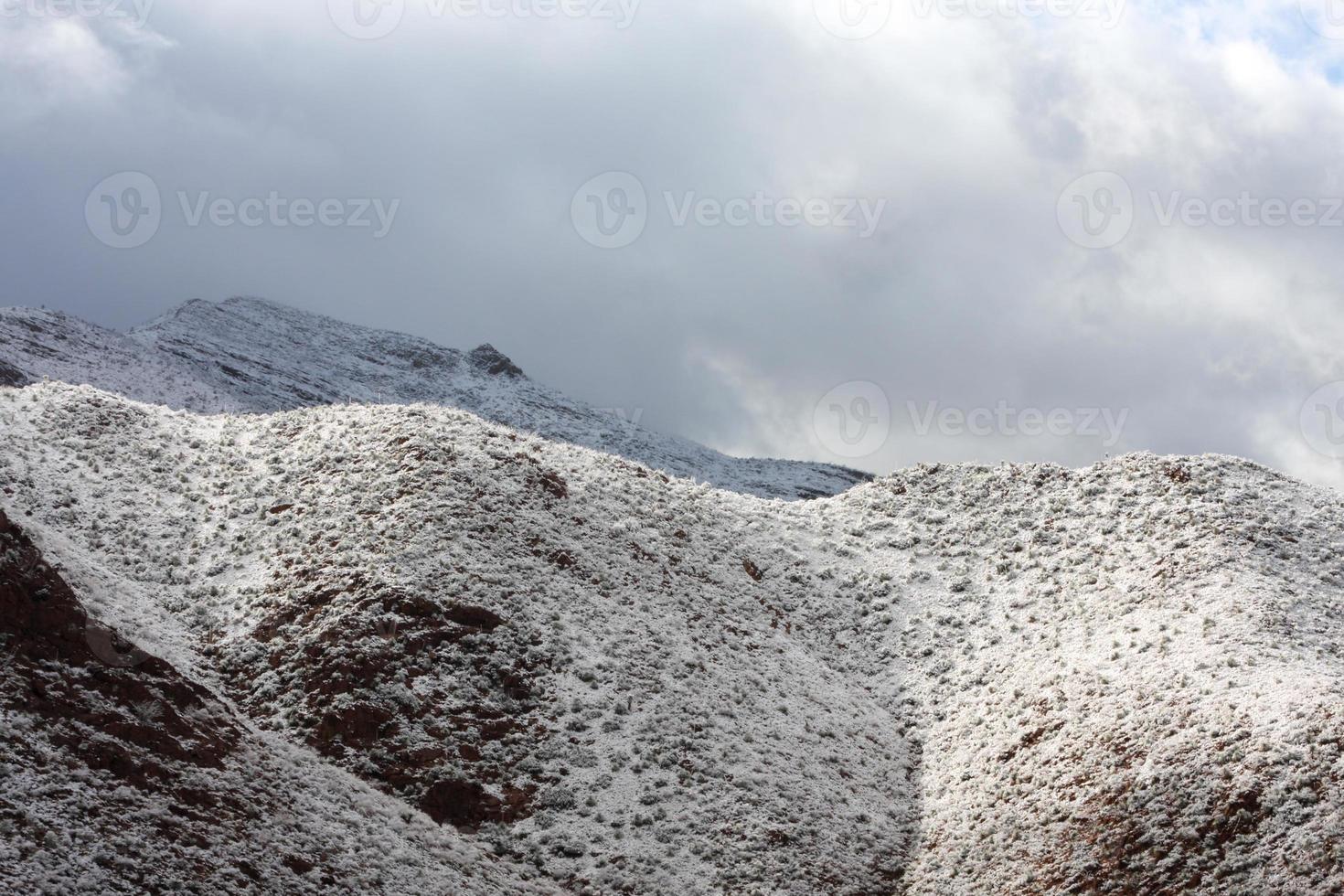 Franklin Mountains on the Westside of El Paso, Texas, covered in snow looking towards Trans Mountain Road photo