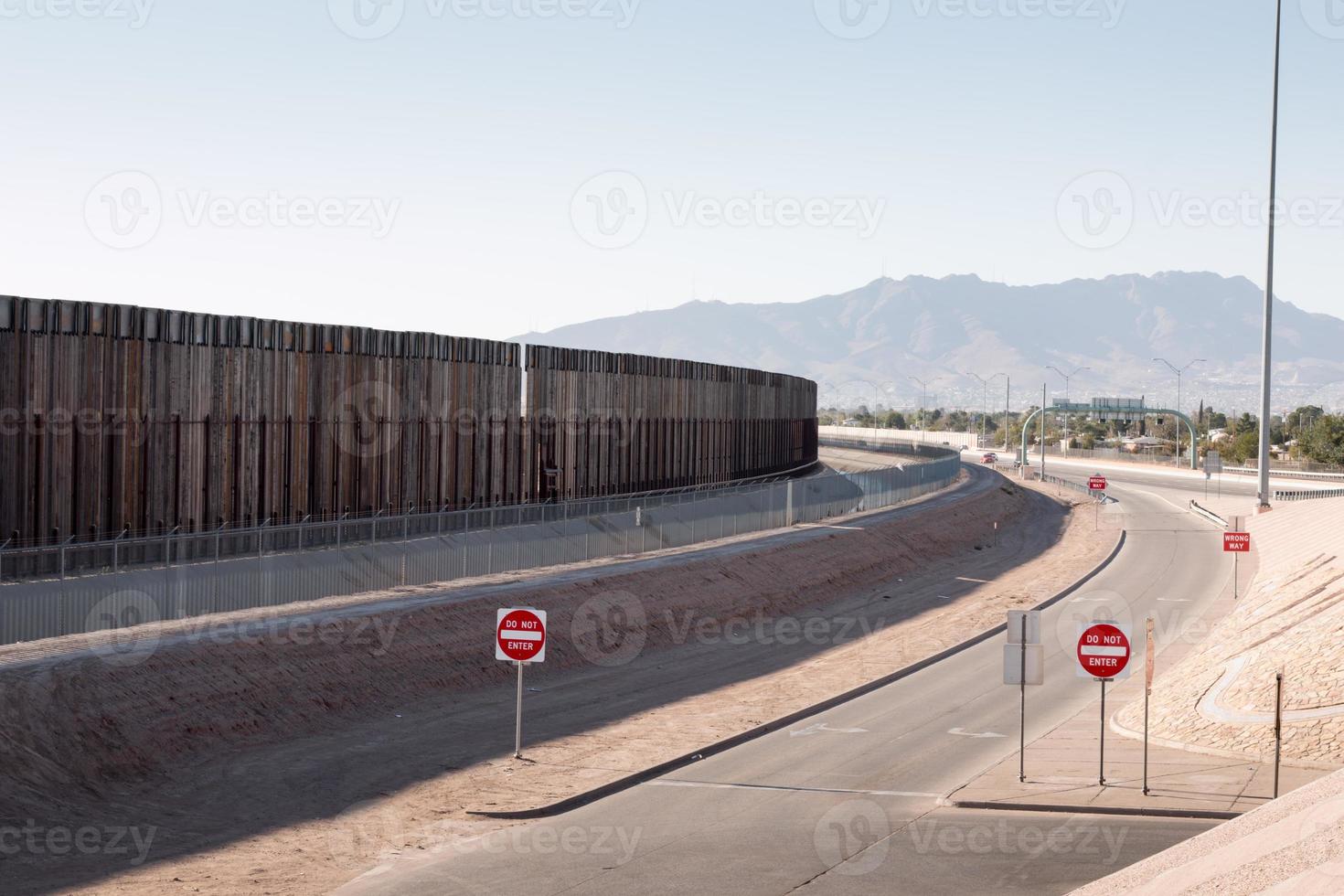 Fence along the US, Mexican border in El Paso, Texas photo