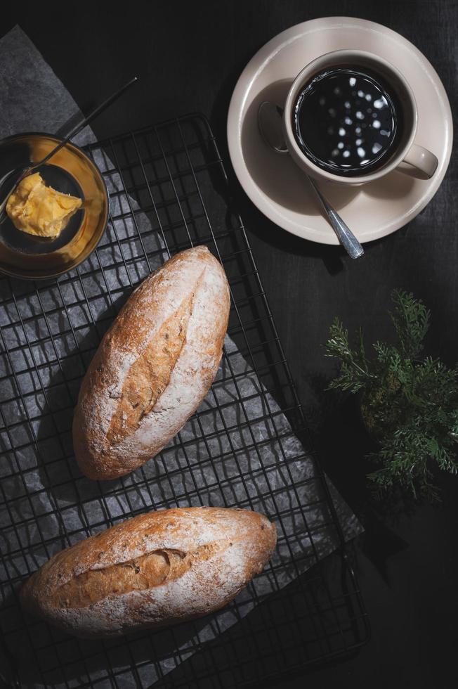 baguette on blue wood table photo