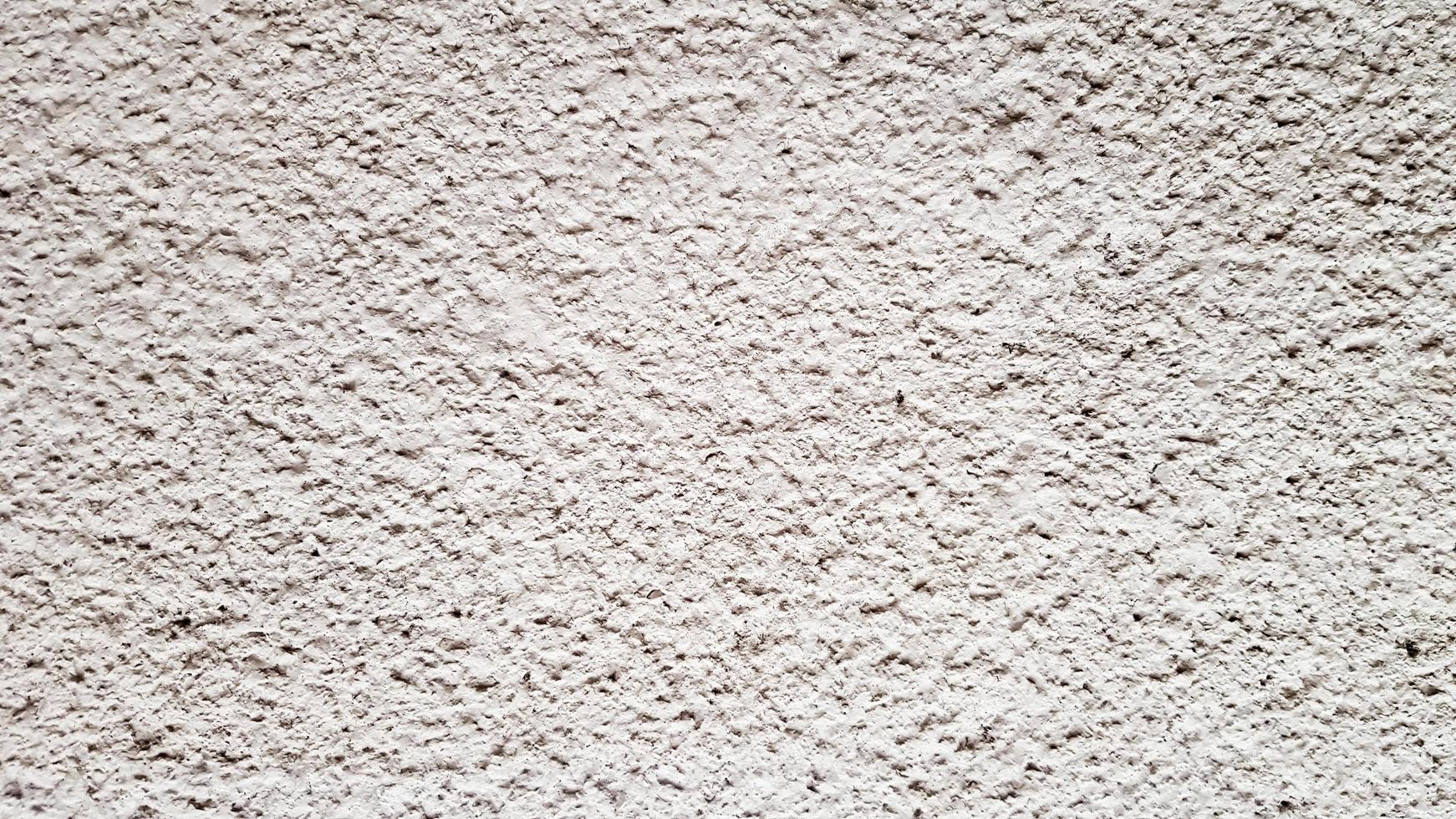 Concrete wall texture. White stucco wall background. White painted cement wall. White concrete wall and floor as background texture. Loft in the style of design ideas of a residential building. photo