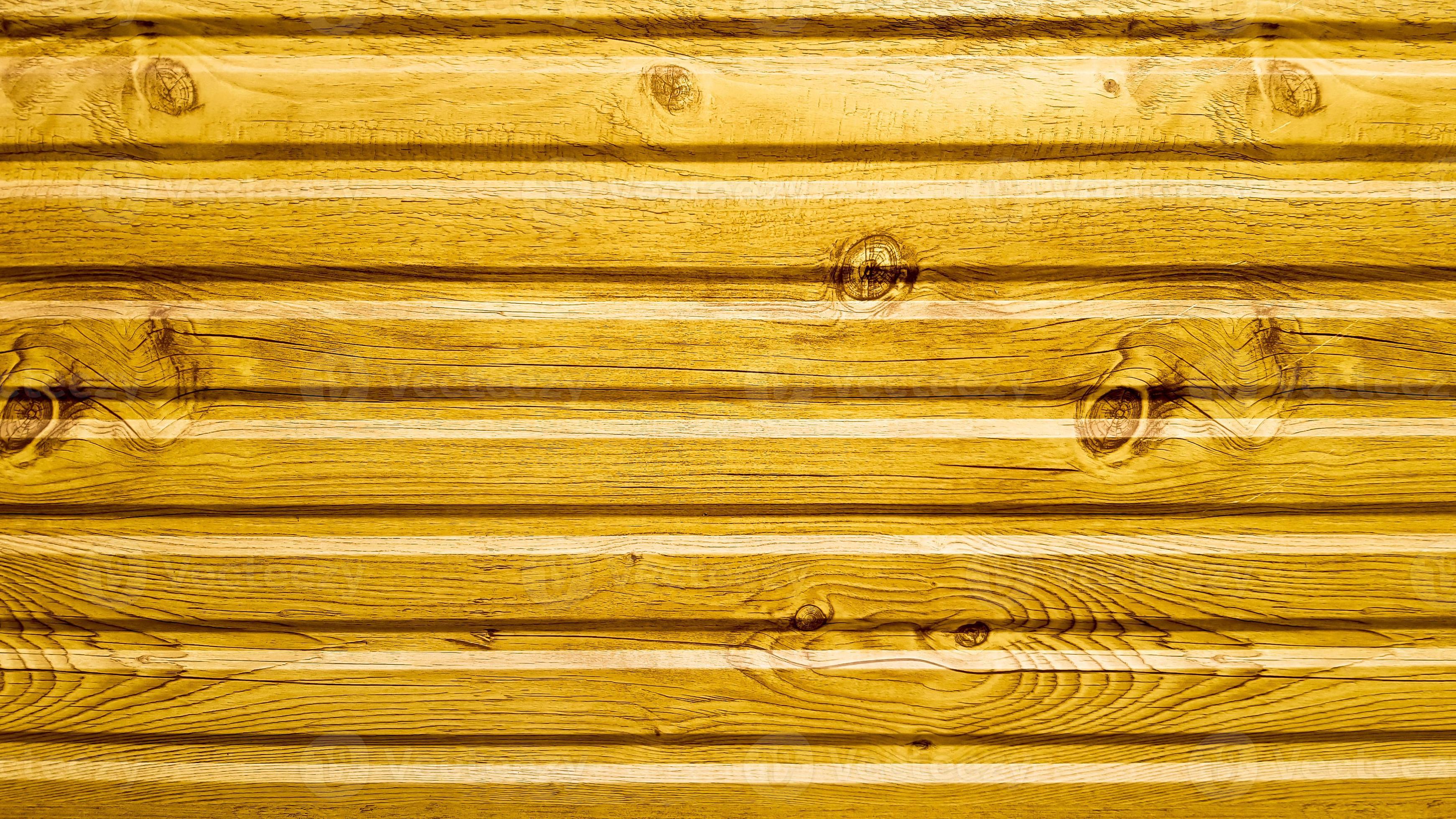 Light yellow painted wood texture, seamless textured pattern. The wall of bright yellow