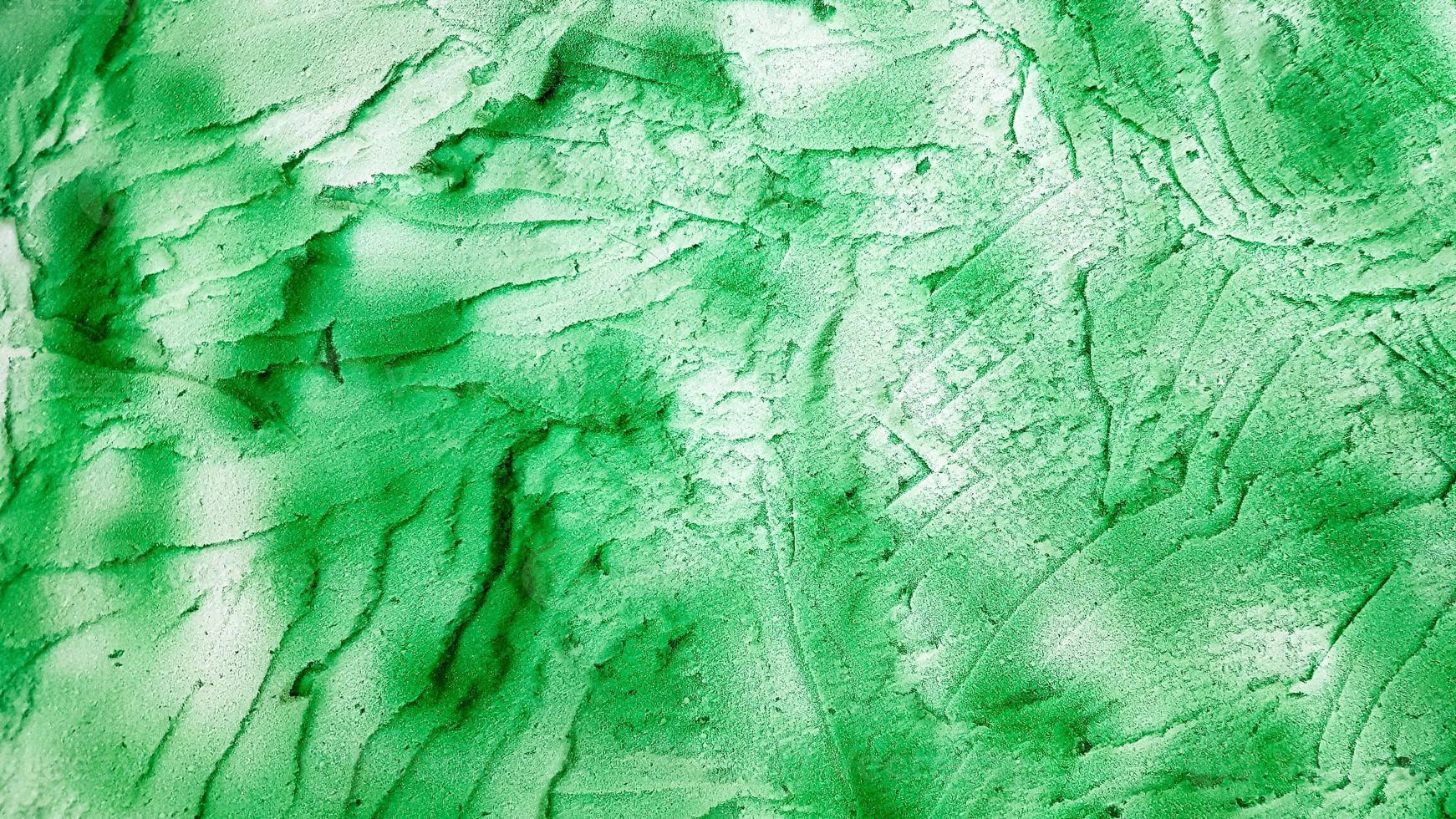 Green sponge texture. Polystyrene foam texture background. old green foam rubber texture as background photo