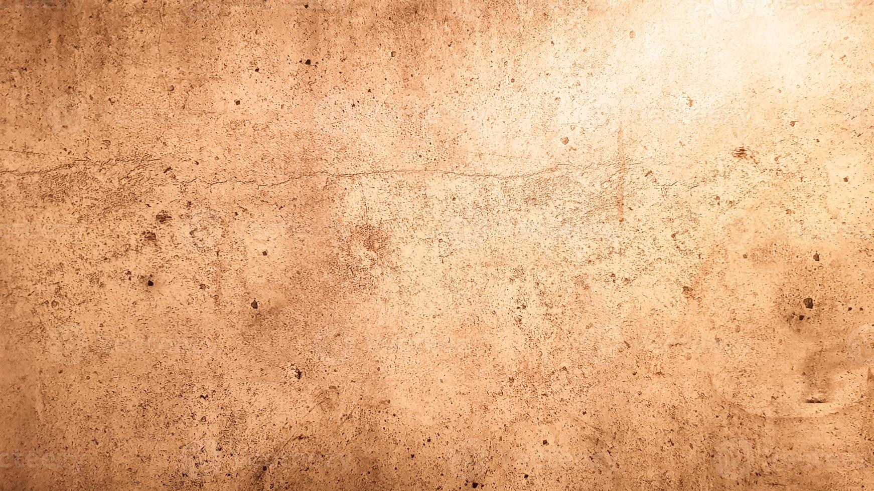 Granite stone texture. Brown golden stone background. old empty stone wall surface or ancient dirty brown paper texture background brown or beige. brown gold grunge. photo