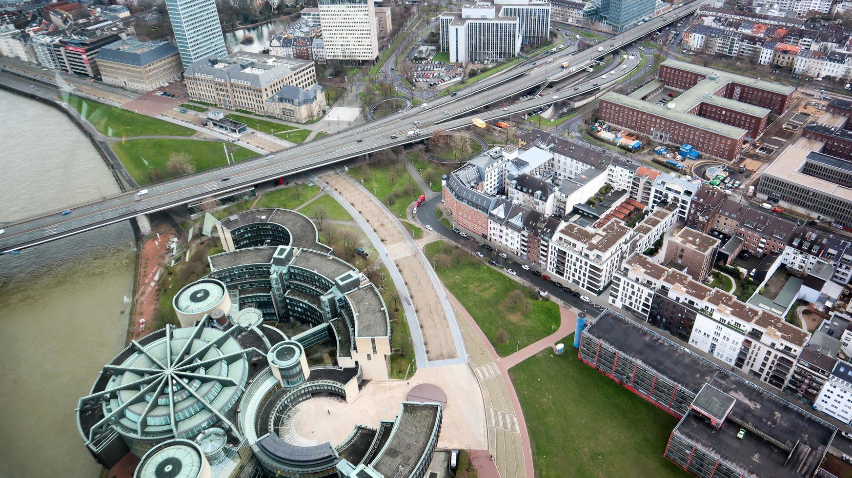 Dusseldorf, Germany - February 20, 2020. Scenic view of the city of Dusseldorf, the embankment of the river and the Rhine. Aerial view of a European city in Germany. Aerial view of a drone. Panorama. photo