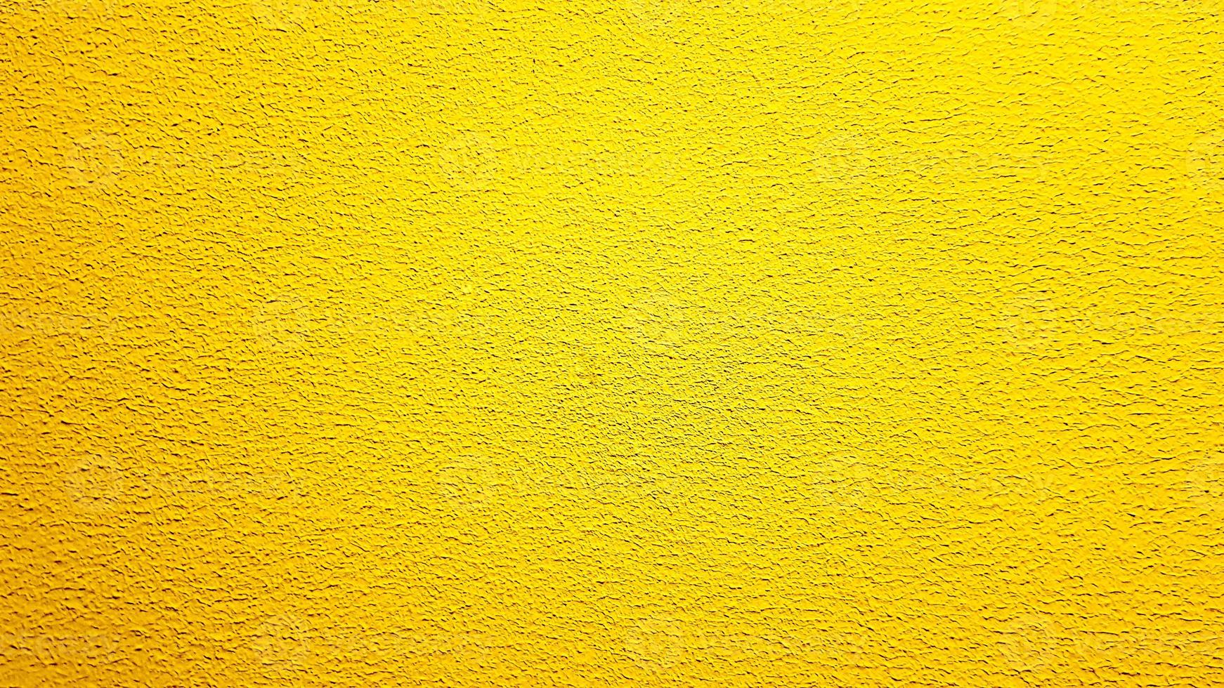 Fondo de grunge abstracto de textura de pared pintada de rojo y amarillo con espacio de copia. patrón geométrico abstracto en la pared. la pared está dividida en bordes de diferentes colores foto