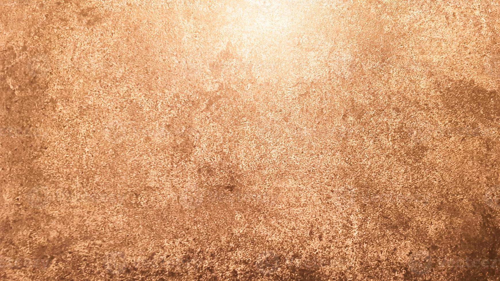 textura de piedra de granito. Fondo de piedra dorada marrón. Superficie de pared de piedra vacía vieja o fondo de textura de papel marrón sucio antiguo marrón o beige. grunge de oro marrón. foto