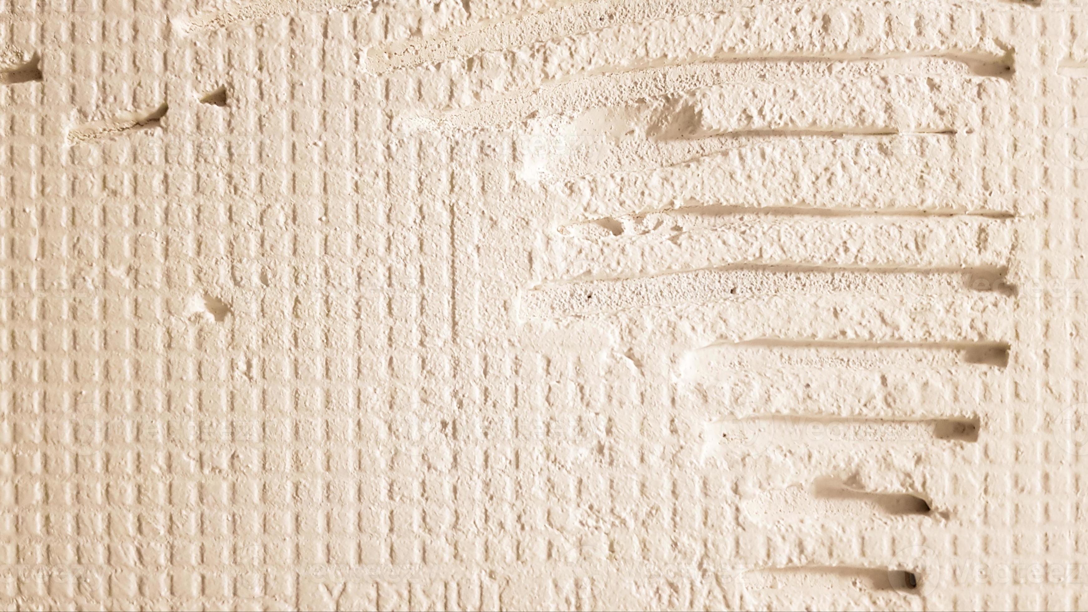 Glue for a tile with a gear pattern. Installation of tiles. The surface