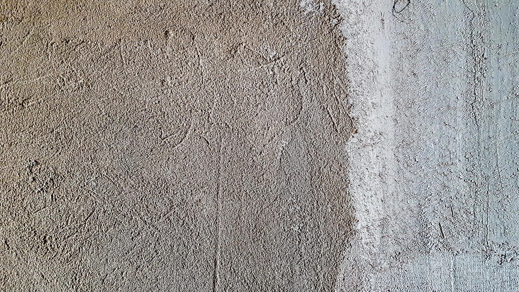 Vintage interior of a gray cement wall. Plaster texture. Grungy gray textured background in a rustic style. Concrete plaster. Pattern Details Empty Blank Space Copy Macro Closeup photo