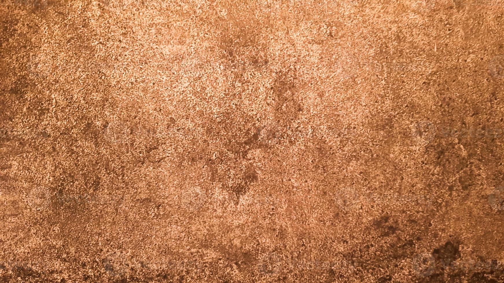 Granite stone texture. Brown golden stone background. old empty stone wall surface or ancient dirty brown paper texture background brown or beige. brown gold grunge. photo