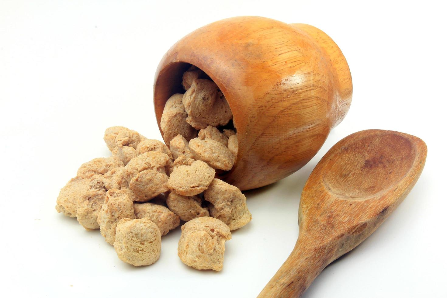Soy meat in chunks on white background. Raw soybeans chunks photo