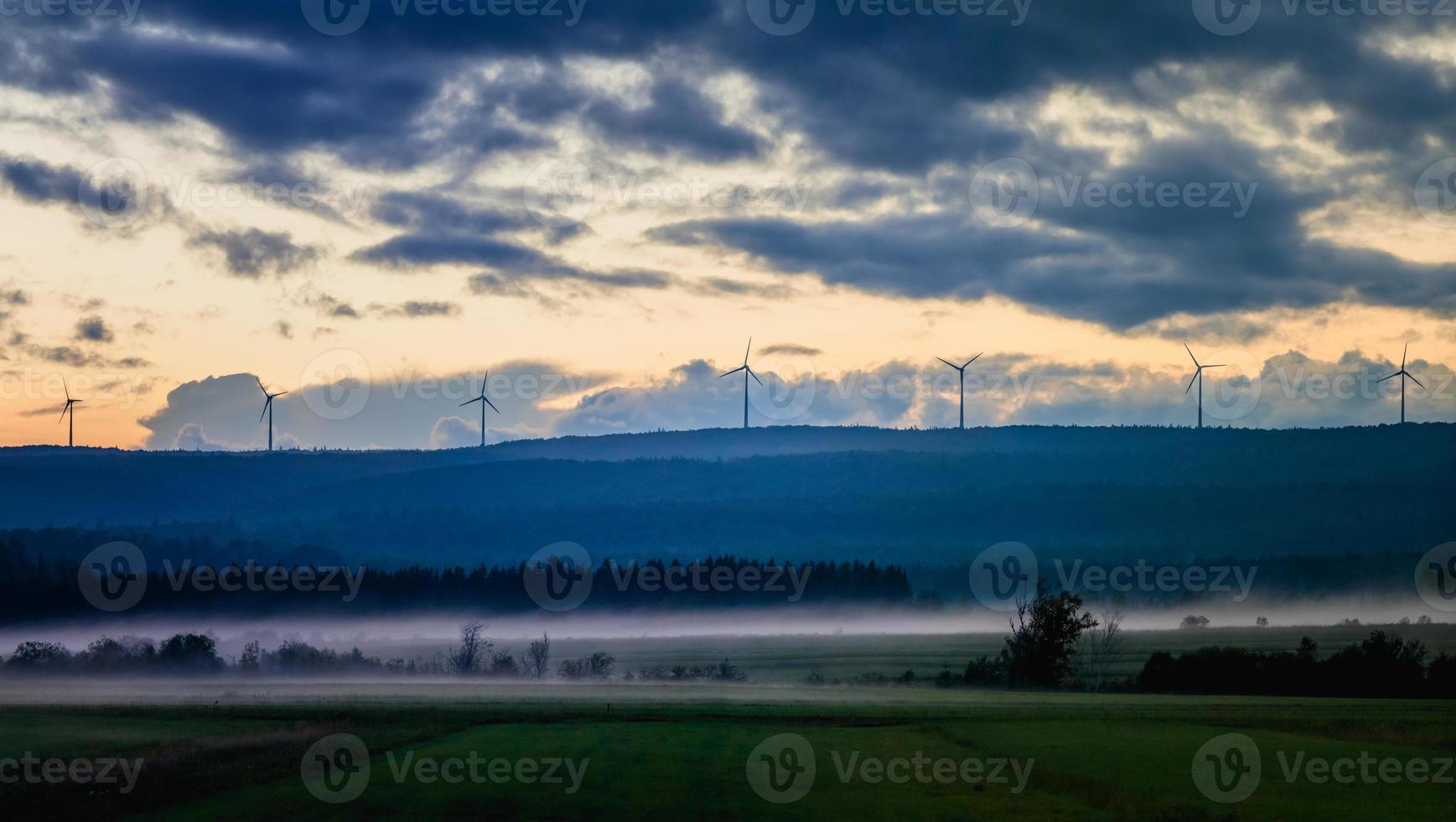 Picturesque view of fields in fog photo