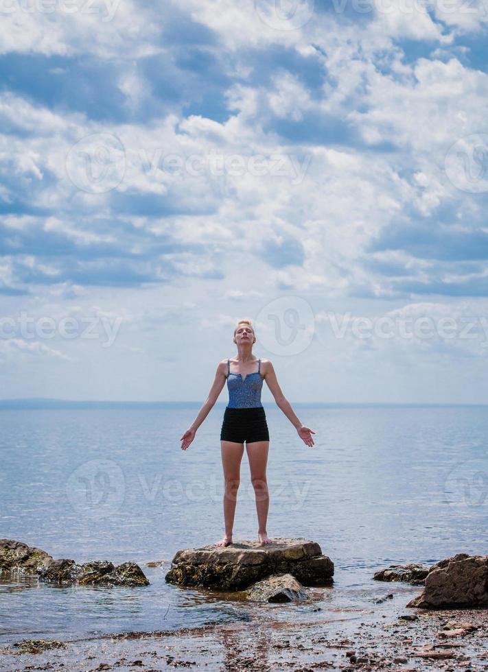 Young Woman doing Yoga Position photo