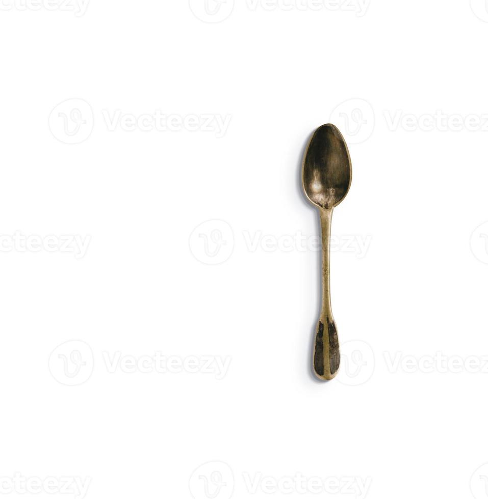 Flat lay vintage spoon on white background. classical concept design. photo